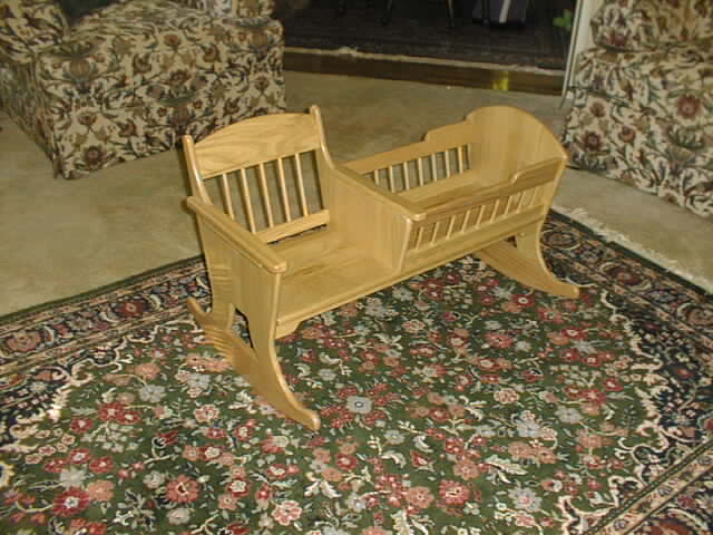 photo of wooden rocking cradle