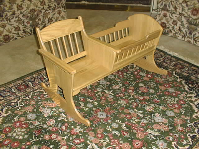 photo of wooden rocking cradle